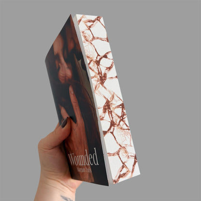 Wounded: A Damaged Heart Story